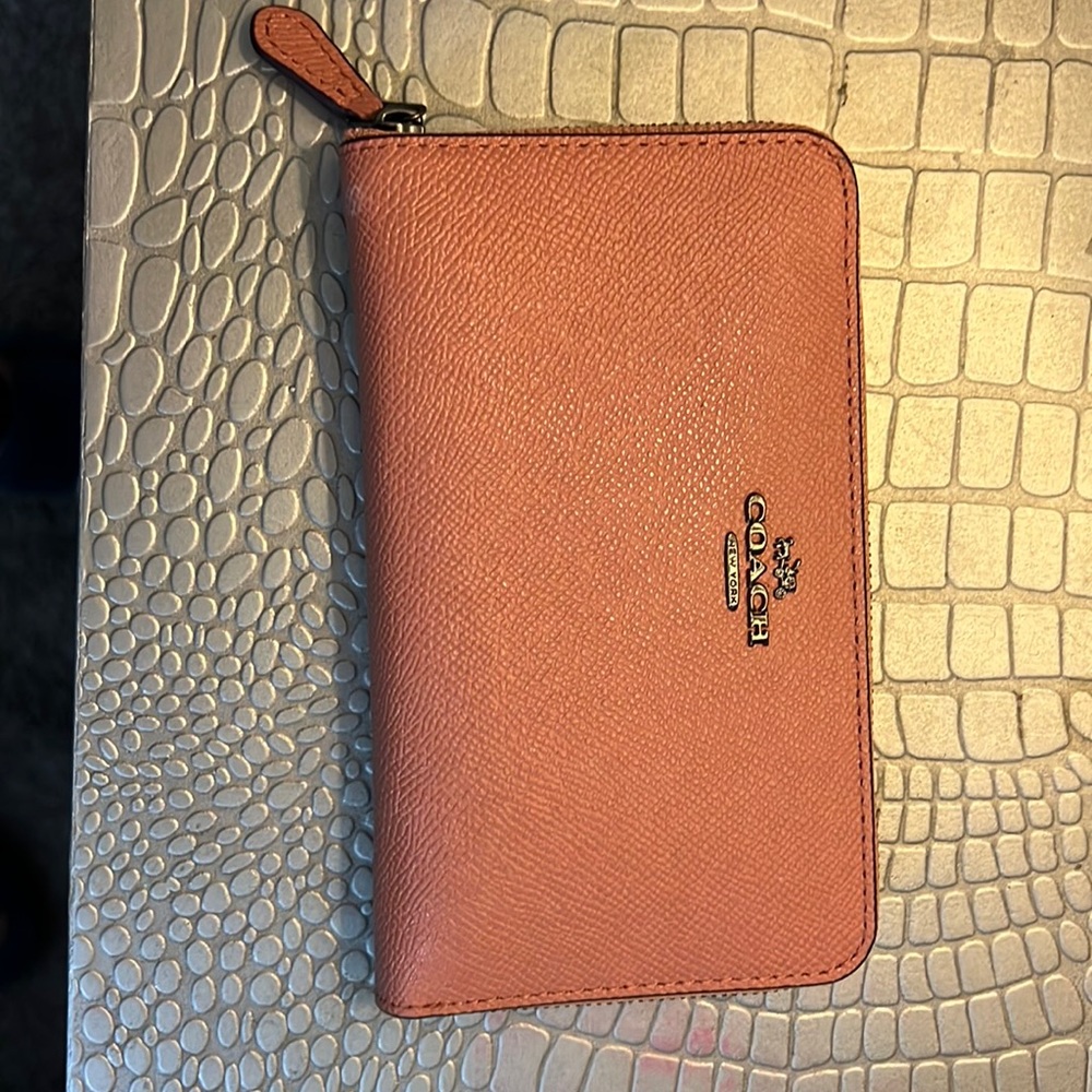 Coach zip around wallet a beige rosey color with gunmetal accents